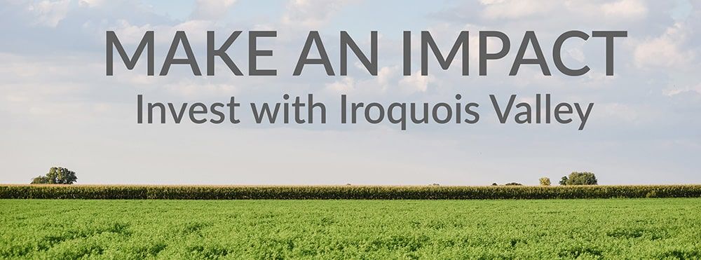 A green field under a partly cloudy sky with the text "MAKE AN IMPACT. Invest with Iroquois Valley" in large letters across the top.