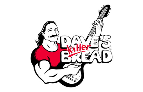 A muscular man with long hair and a mustache, wearing a red shirt, holds an electric guitar. The text "Dave's Killer Bread" is positioned beside and over the guitar.