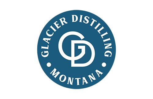 Logo of Glacier Distilling in Montana. It features a blue circle with the initials "GD" in the center. The words "GLACIER DISTILLING" and "MONTANA" are written around the circle's edge.