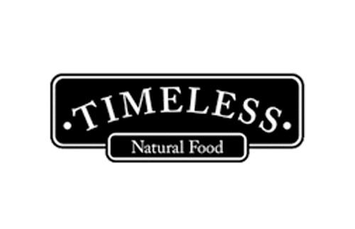 A black and white logo with the word "TIMELESS" in large capital letters and "Natural Food" in a smaller box below.