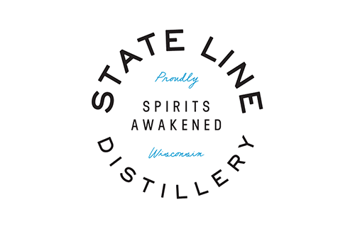 Logo of State Line Distillery with the text "Proudly Spirits Awakened Wisconsin" in the center, surrounded by "State Line Distillery" in a circular format. The text is in a mix of black and blue colors on a white background.