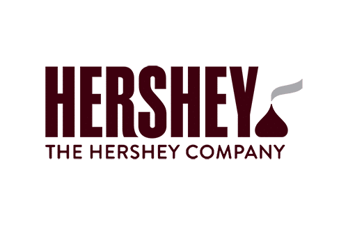 Hershey Company logo featuring the word "HERSHEY" in bold, dark brown uppercase letters. The "Y" ends with a stylized silver Hershey's Kiss shape. Below, in smaller letters, it says "THE HERSHEY COMPANY.