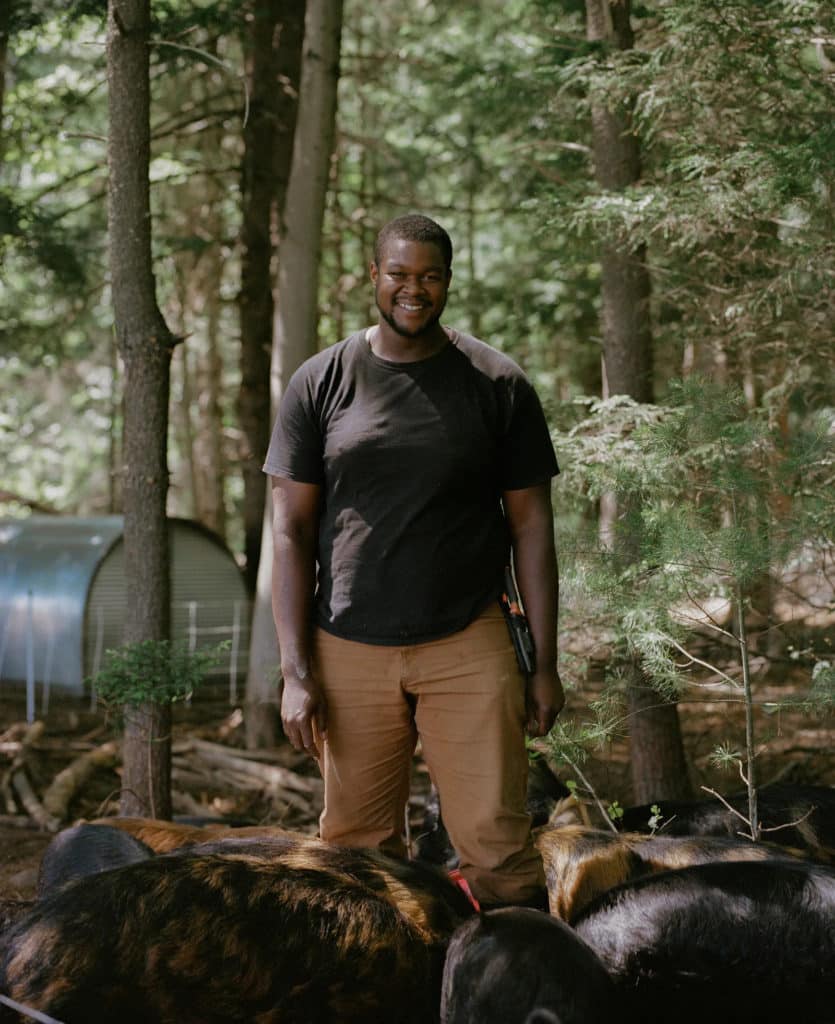 Pictured: Justin the livestock manager at Soul Fire Farm. Photo from Vogue. Justin is a first-generation Navy veteran farmer.