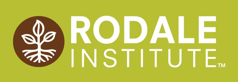 Rodale Institute logo on a green background, featuring a white stylized plant with roots inside a brown circle, next to the words "Rodale Institute" in bold white letters.